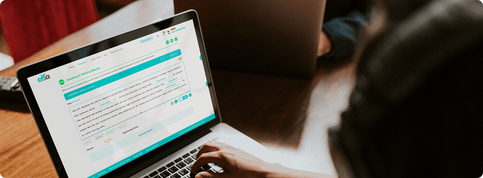 PTE Reading and Writing Fill in the Blanks Practice on Laptop